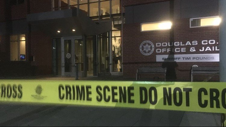 A man is dead after he entered the Douglas County Sheriff's Office and stabbed a deputy