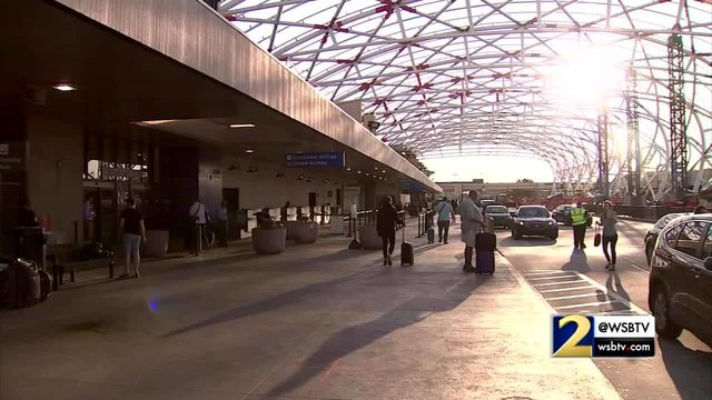 Police say attackers, including a 13-year-old girl, targeted a woman parking at Hartsfield-Jackson Atlanta International Airport. The attacked happened at 9:30 p.m. Monday.