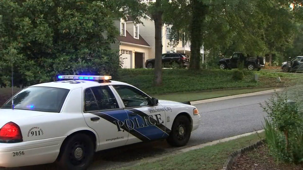 2 Peachtree City residents are in custody and facing charges after an officer was assaulted