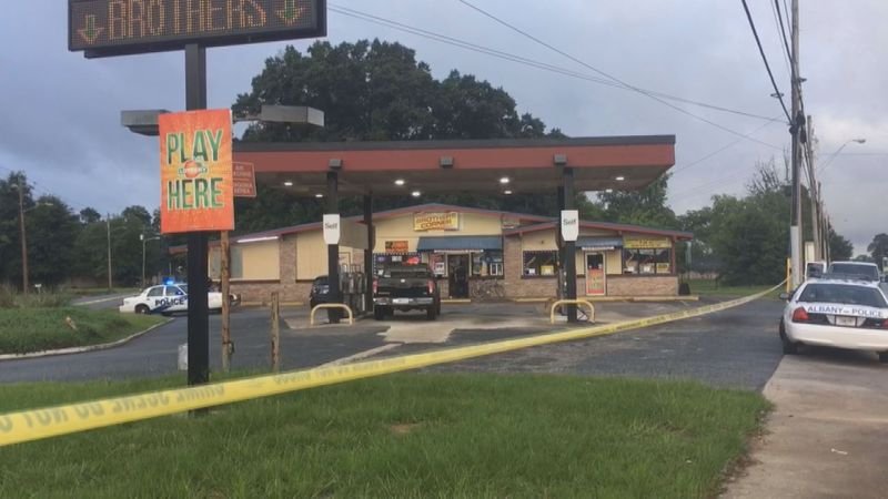 In south Albany, a woman was shot Tuesday morning, and officers are searching the area for two gunmen in the 1100 block of Newton Road.  That business roped off with crime scene tape is Brother's Corner. Police tell us the woman was shot around 6:37 this morning. The victim was taken by ambulance to the hospital.