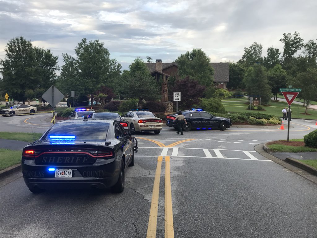 Douglas County Sheriff's Office at scene of a shooting in the middle of Anneewakee Trails Community. Man shot and down in the traffic circle around 2:30 a.m. Spotted by a passing driver