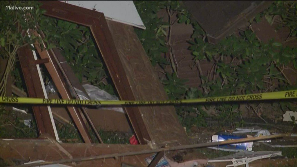 Roswell fire officials are investigating why a house on Pine Grove Point Drive exploded Tuesday night