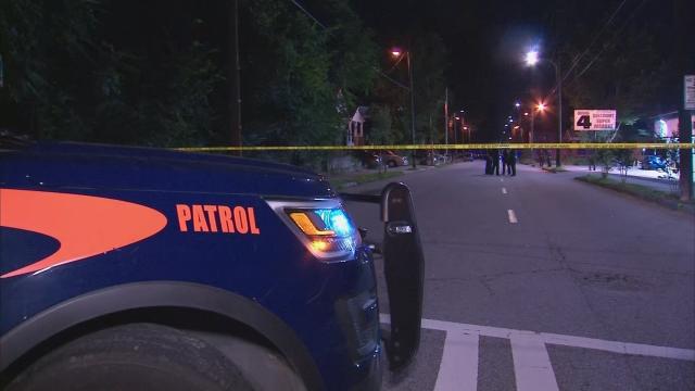 Officer struck by vehicle, suspect on the run following shooting at marke   