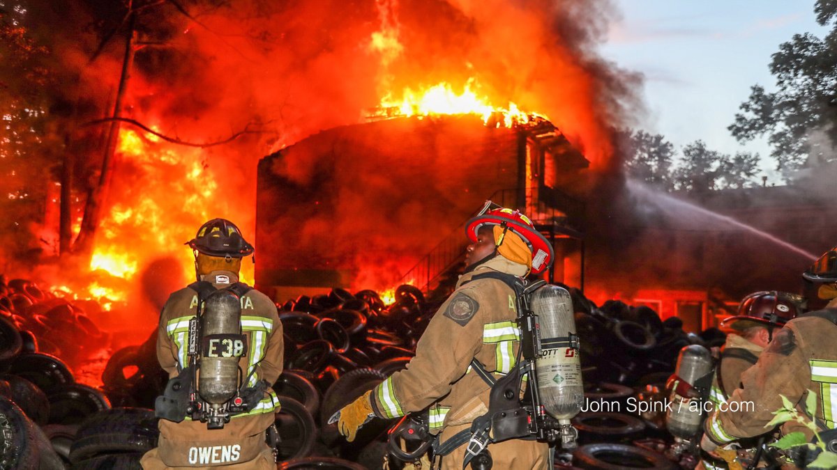 A large fire is sending smoke and flames into the air in northwest Atlanta