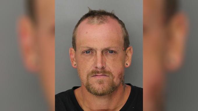 Man arrested after throwing rocks at cars for 5 hours on freeway's new toll lanes, police say    