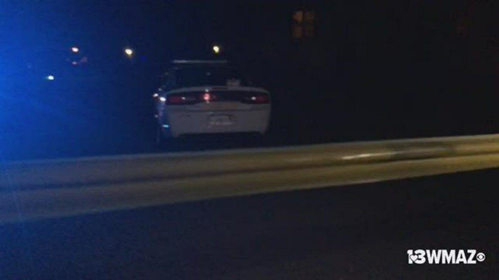 30 year-old Michael Antwan Chapman lying in the road with multiple gunshot wounds. Chapman was taken to Navicent Health Center where he was later pronounced dead.