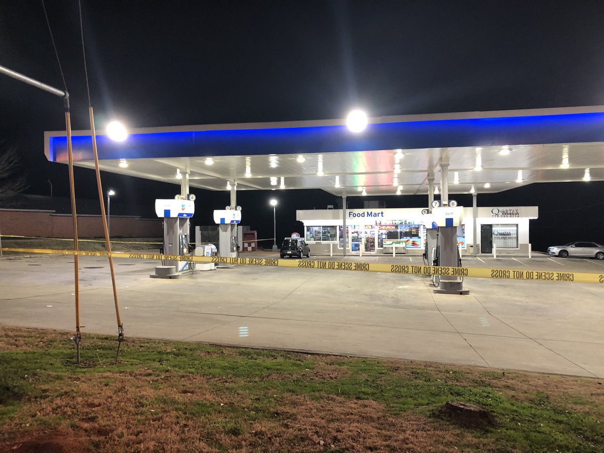 The Chevron gas station on Candler Rd is still taped off hours an officer involved shooting 