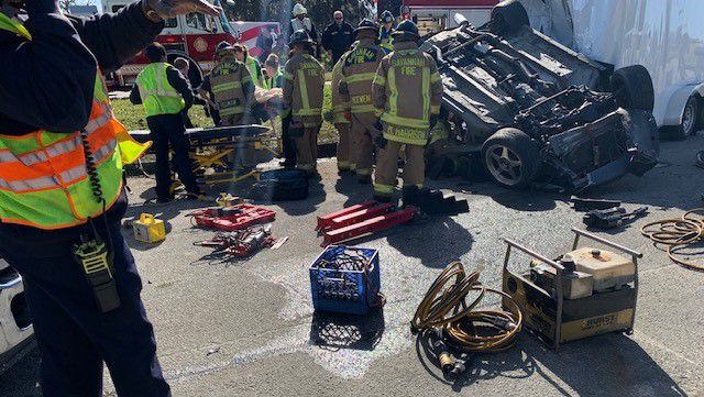 Car goes airborne in Savannah, crashes into trailer. 2 sent to the hospital    