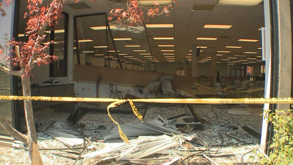 Driver crashes into DMV, sending 2 people to hospital    