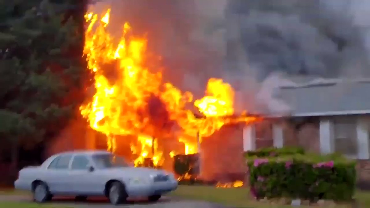 A house is fully engulfed in flames in Warner Robins on Hazel Drive