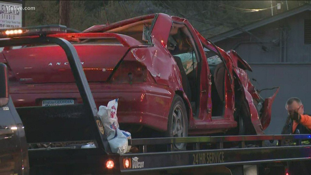 Driver killed after car goes into building; 2 more transported  