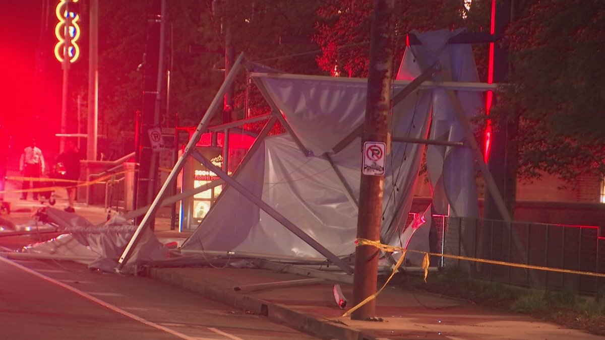 2 people injured when gusts of wind blow canopy from Ponce City Market 