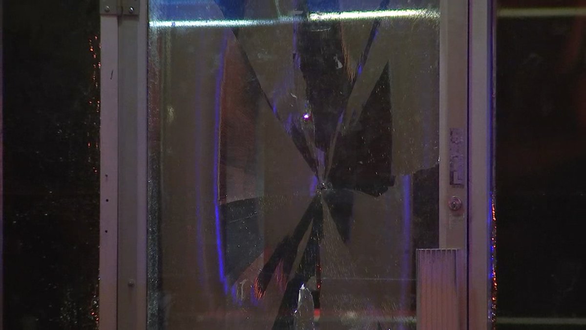 The security guard is OK, he was wearing a protective vest. He suffered a bruise to the chest from the impact of the bullet.  No one else was hurt and police are searching for the shooter.