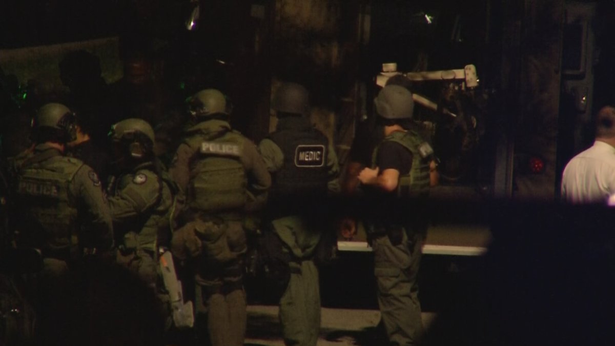 Police have three people in custody after a SWAT team was called to a home in northeast Atlanta Monday night.