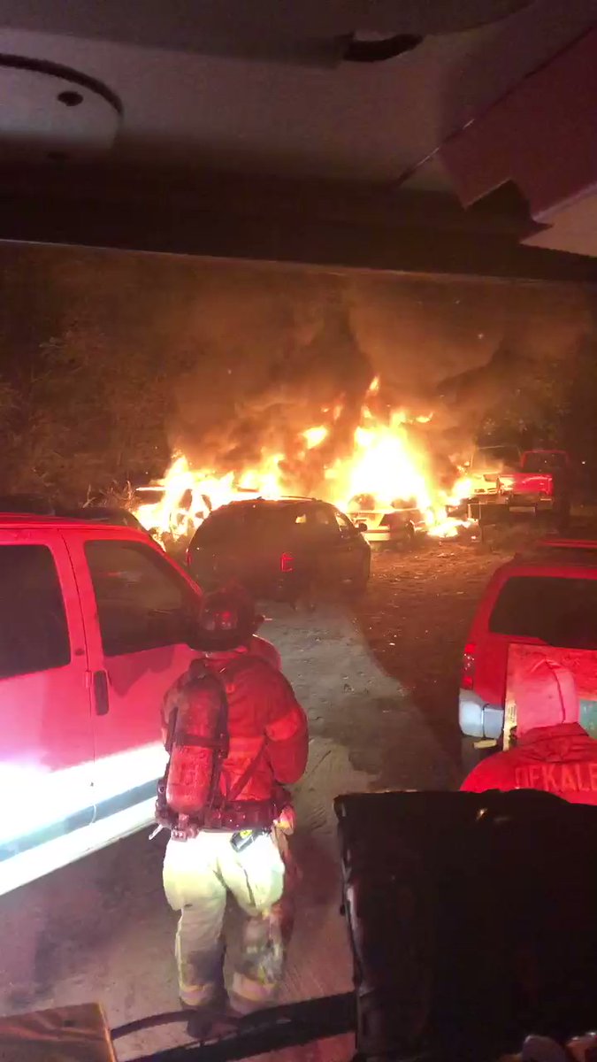 From DeKalb Firefighters where dozen cars burned on lot off Stone Mnt. Lithonia Rd.   