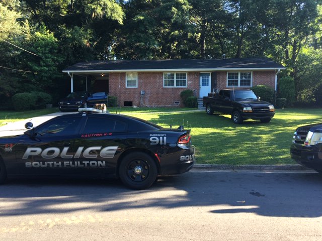 Several City of South Fulton PD officers on scene of drug raid at home on 2700 block Ocean Valley Rd.   