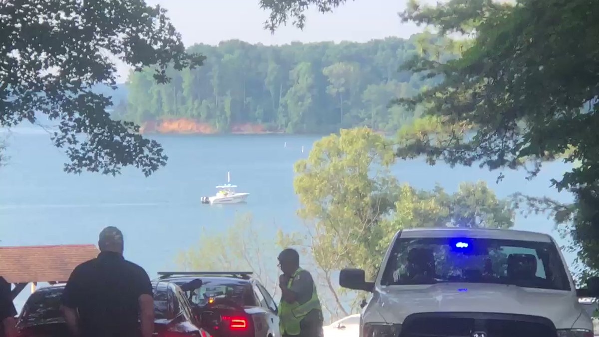 Search teams on boats make trips back and forth in a small section of eater near Vann's Tavern in Lake Lanier. Meanwhile several people hoping to go boating here have been turned around. The area is CLOSED until further notice.