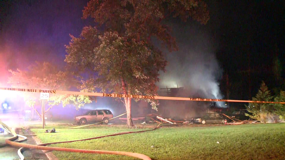 Fire crews are sifting through what's left of a home in Austell in Cobb County. Home appears to still be smoldering 