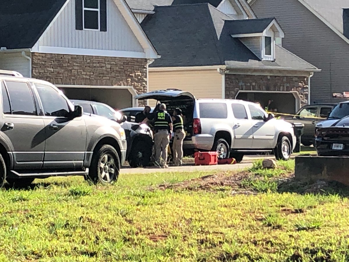 A man and woman are dead following an officer-involved shooting at a home in Porterdale Tuesday morning.