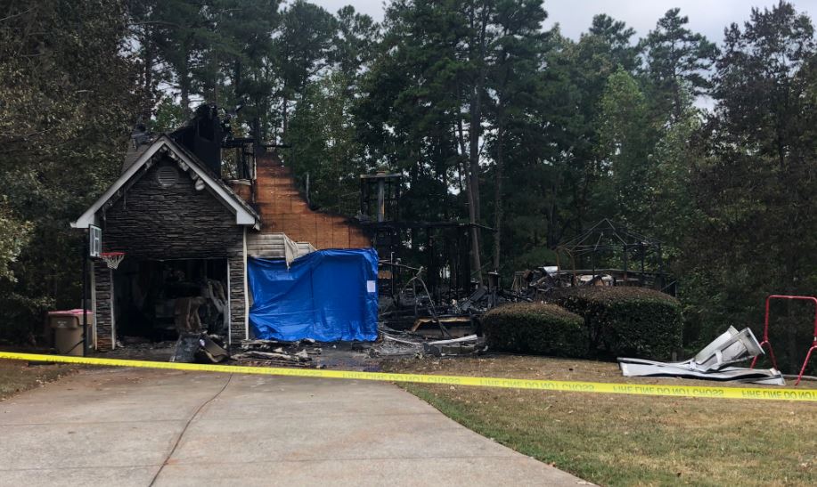9 and 12-year-old siblings killed in metro Atlanta house fire after mother unable to get to them