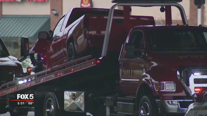 Investigators said the driver of a red pickup truck ran a red light and slammed into a white sedan.  The female driver of the sedan died at the scene.  First responders transported a child who was inside the truck to a local hospital.  Police said a woman inside the truck ran from the scene, but police detained the male driver.