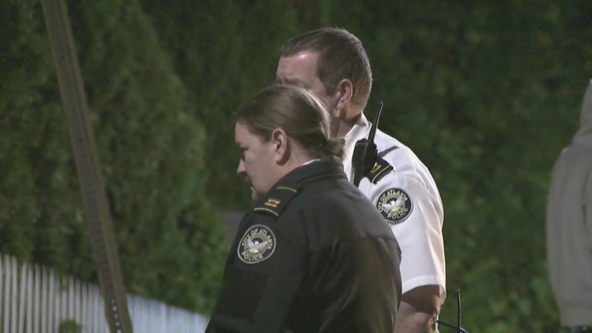 Police say two masked men carrying firearms entered an AirBNB property on Wylie St, demanding the victims' phones, wallets and shoes around 2:30am. One victim was struck in the head.