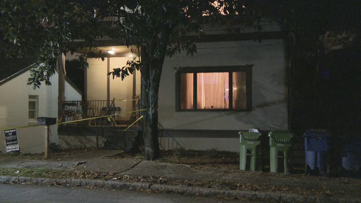 Police say two masked men carrying firearms entered an AirBNB property on Wylie St, demanding the victims' phones, wallets and shoes around 2:30am. One victim was struck in the head.