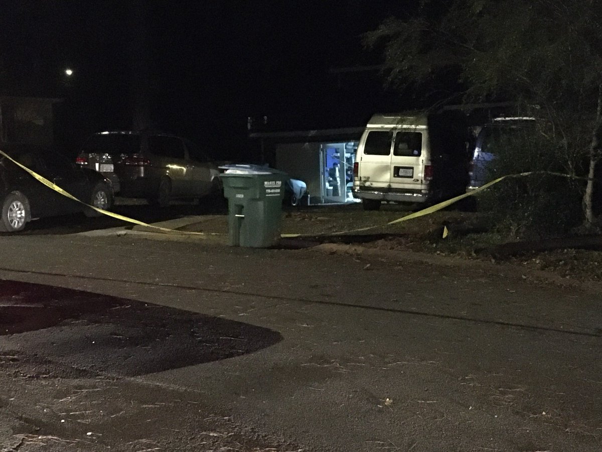 Gwinnett police on the scene of a murder. The victim, a 30 year old Hispanic man was visiting family for Thanksgiving when the shooting happened .
