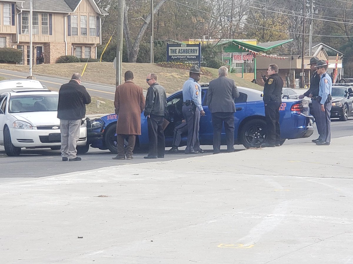 One man handcuffed and put into DeKalb cruiser. Chase ends in crash on Flat Shoals. One man is shot on 285 EB.