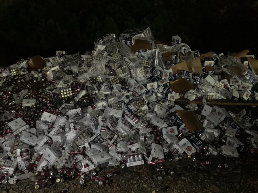 Train collides with truck hauling cases of beer in McDonough