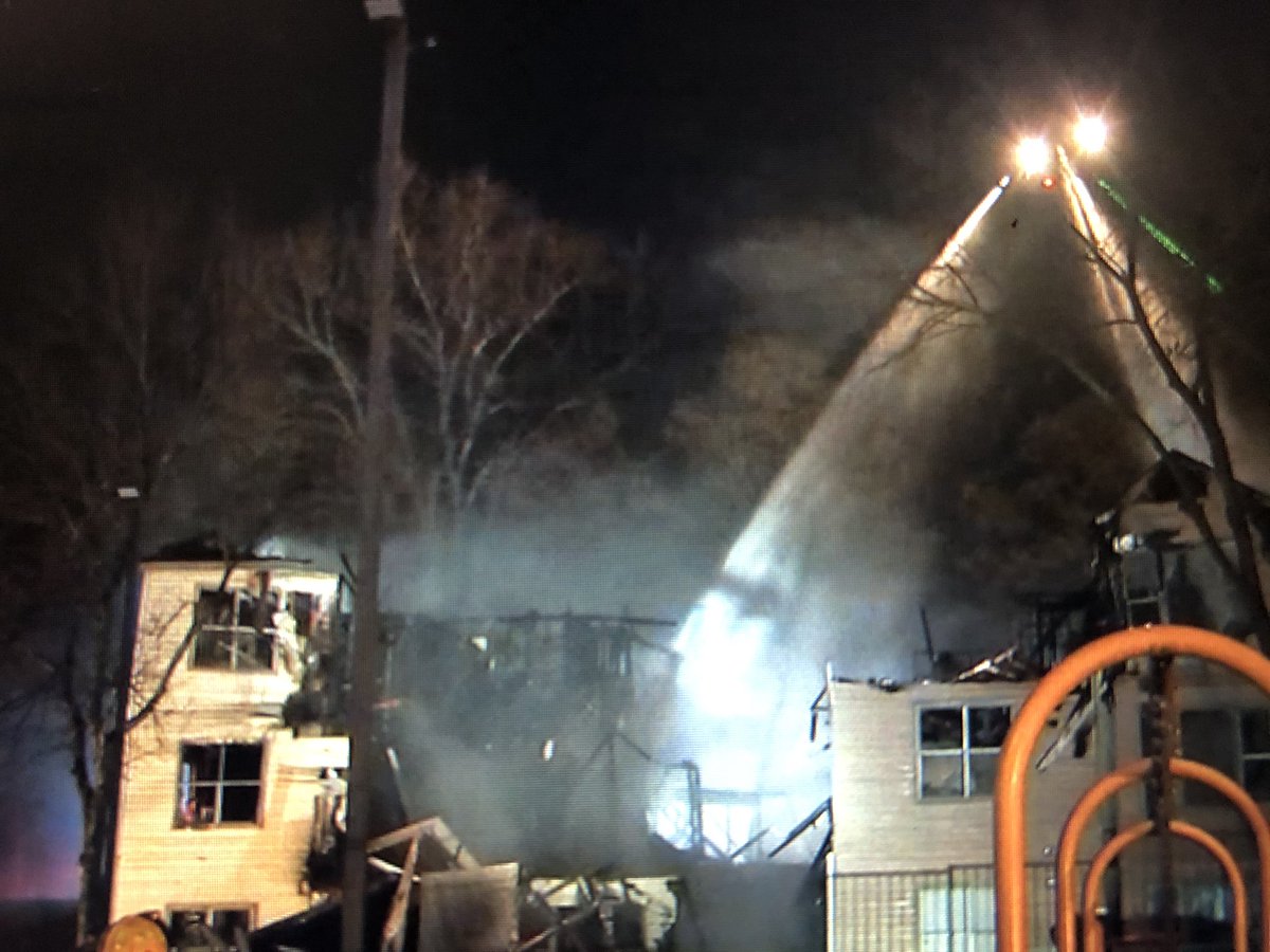 A massive fire destroyed half an apartment building several families including children loss everything