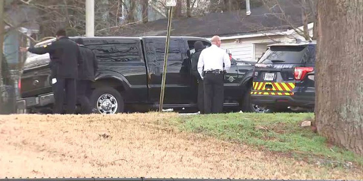 Man armed with weapon barricaded inside home; child believed to be inside