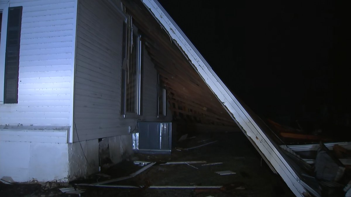A line of severe storms that moved across metro Atlanta Saturday night downed trees and power lines, flooded roads and even sparked a massive fire at one home.