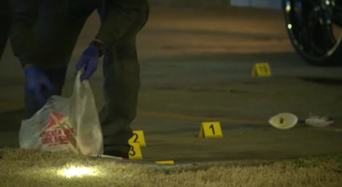 Man & woman shot in parking lot of a SW Atl KFC-Taco Bell. 2 gunmen fired several shots into the car the victims were sitting in.