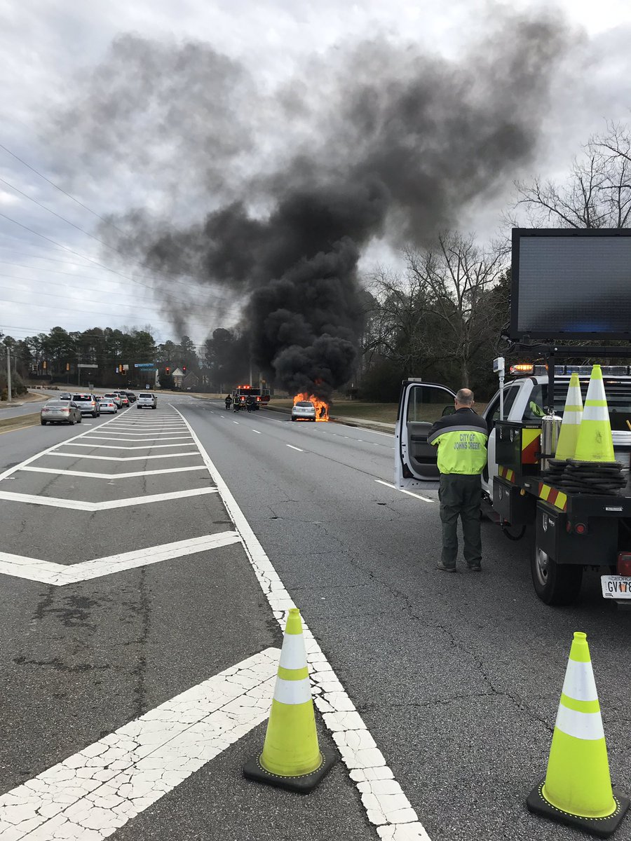 Two EB lanes of McGinnis Ferry Rd at Roger Bridge Rd are blocked.  