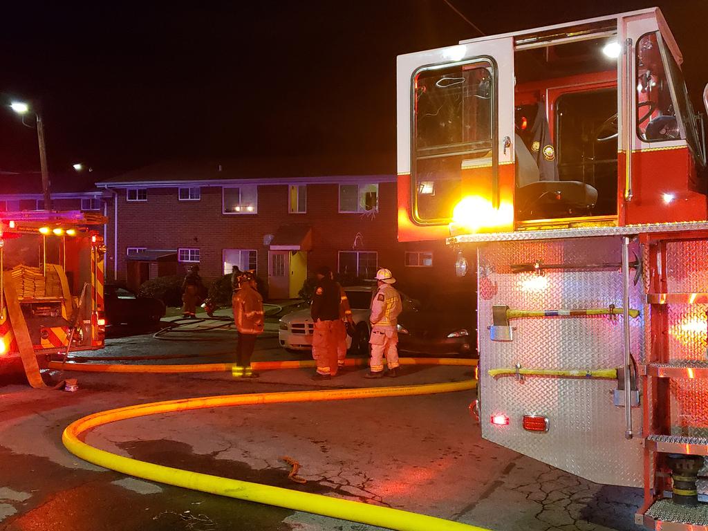 Firefighter hurt saving woman & 2 small children. All suffered smoke inhalation in Cleveland Ave apt blaze