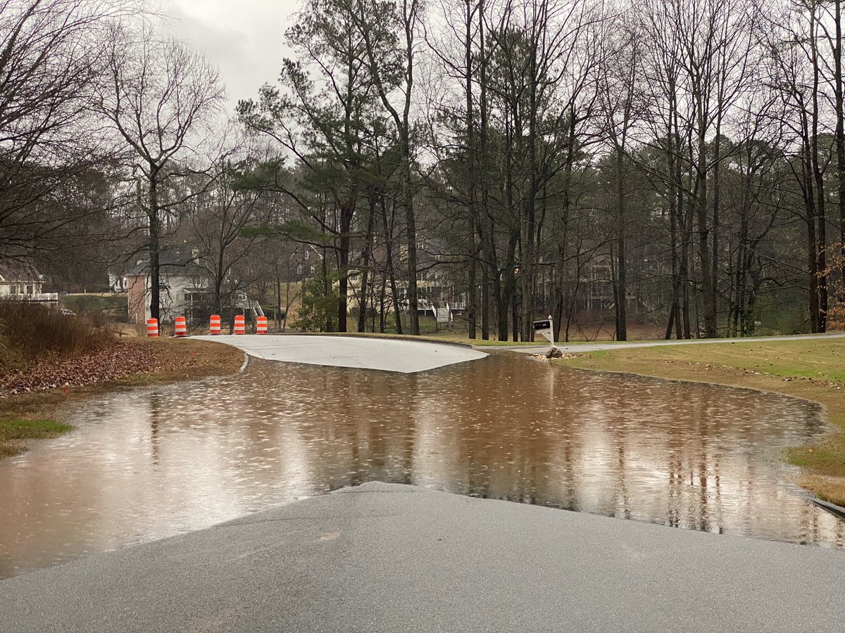 Flooding in this Douglasville subdivision on Grace Lake Drive. This entry point is blocked off but there is another one. Take Logan Lane to Parkwood Ave to exit. 