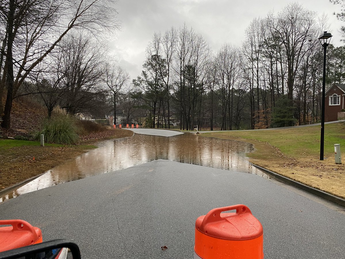 Flooding in this Douglasville subdivision on Grace Lake Drive. This entry point is blocked off but there is another one. Take Logan Lane to Parkwood Ave to exit. 