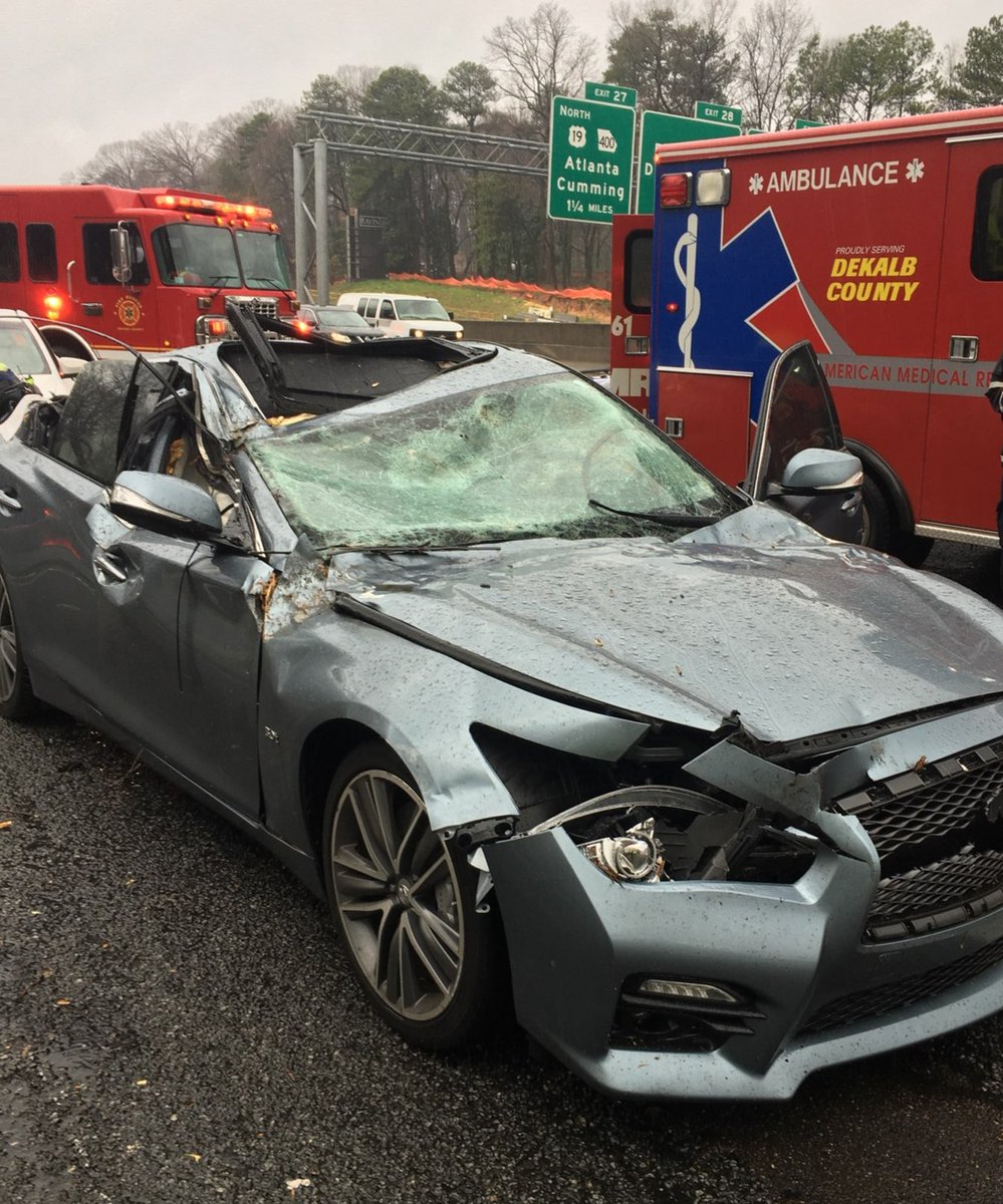 A tree down fell on this vehicle traveling I-285 EB at Ashford Dunwoody Rd. Thankfully no serious injuries. Crews are working to open up the interstate