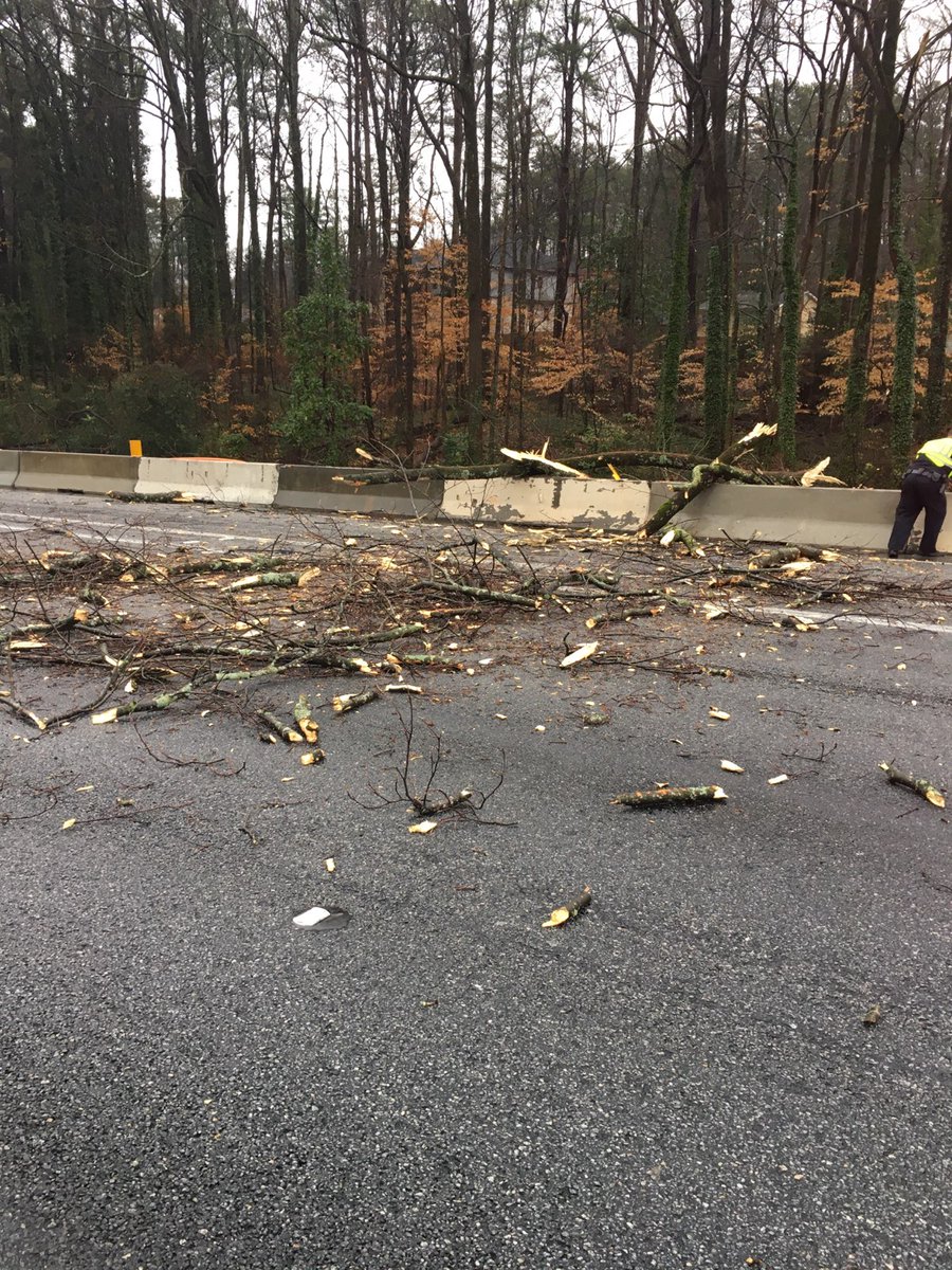 A tree down fell on this vehicle traveling I-285 EB at Ashford Dunwoody Rd. Thankfully no serious injuries. Crews are working to open up the interstate