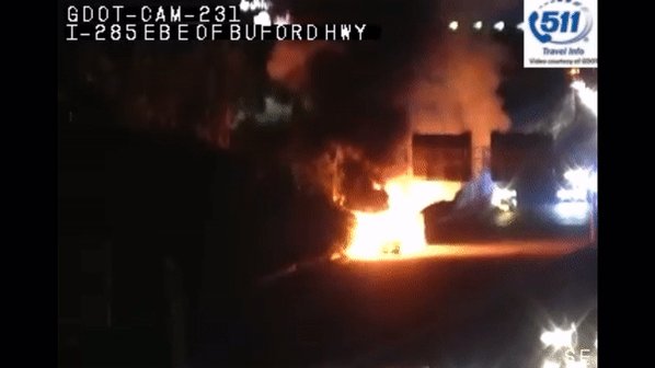 Flames pouring from that vehicle fire on I-285 WB near Buford Hwy that's blocking several lanes. 