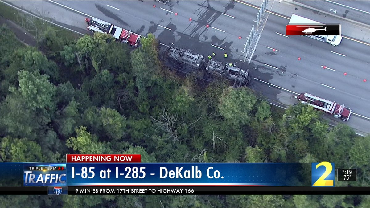 Everything's off to the right on I-85SB's ramp to get onto I-285WB in DeKalb County after a bus fire had the exit shut down. The driver made it out alive. All lanes are back open. 