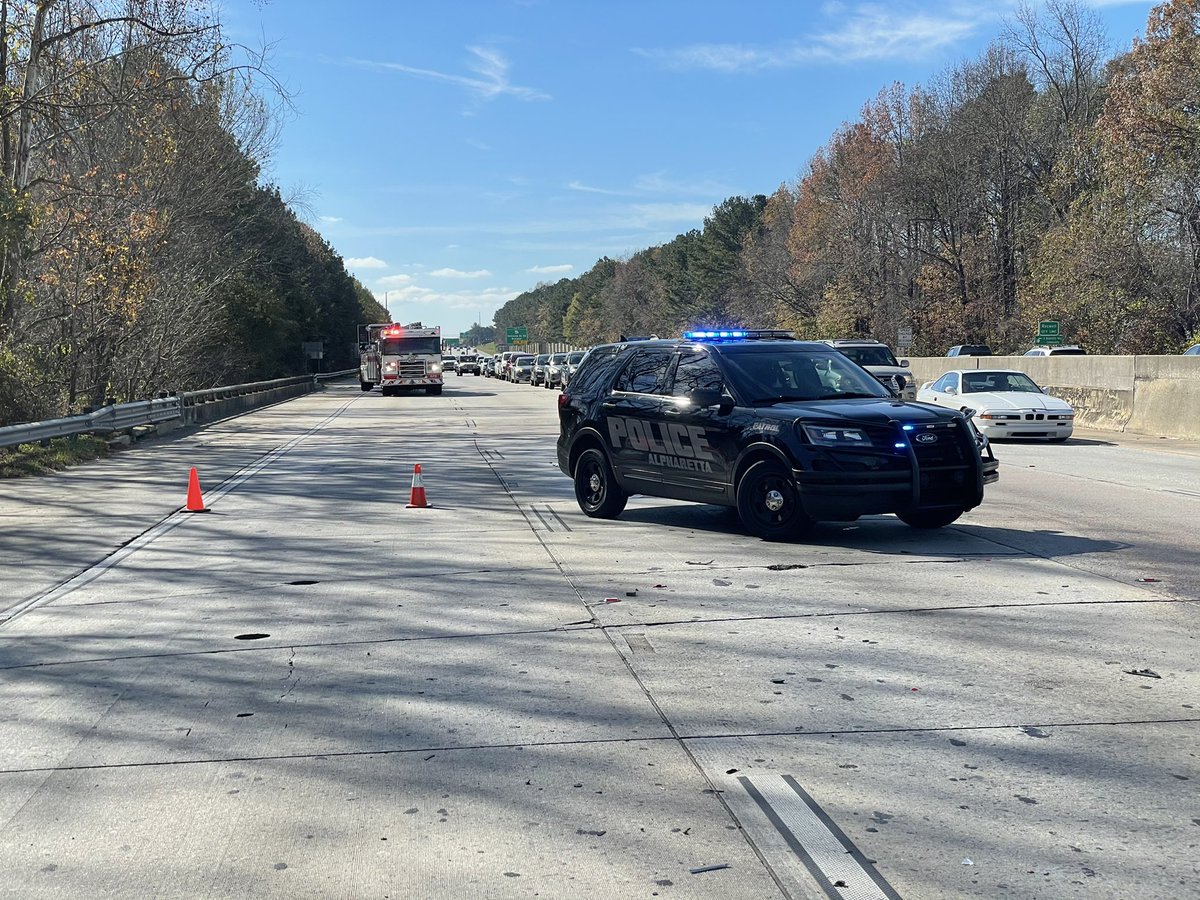 Scene of a multi vehicle accident on GA400NB at the Mansell Road exit.  Only the far left lane is open at this time. 
