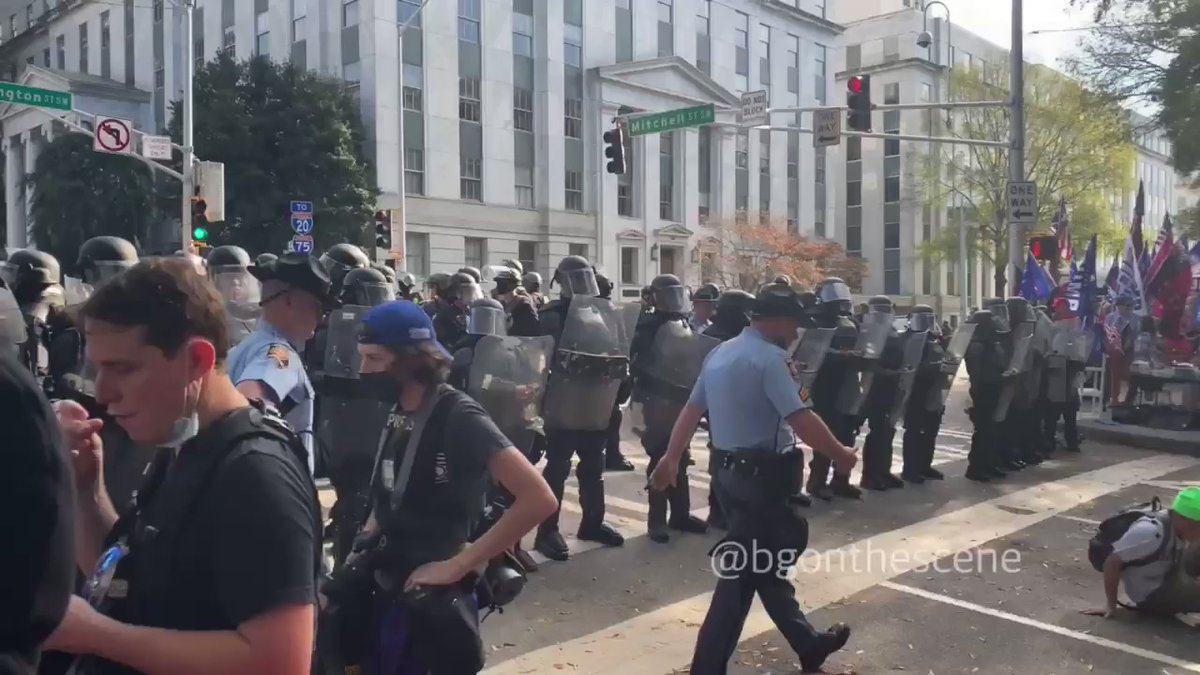 Police move a man out of the street after refusing to leave with the rest of the protesters Atlanta Georgia AtlantaProtest
