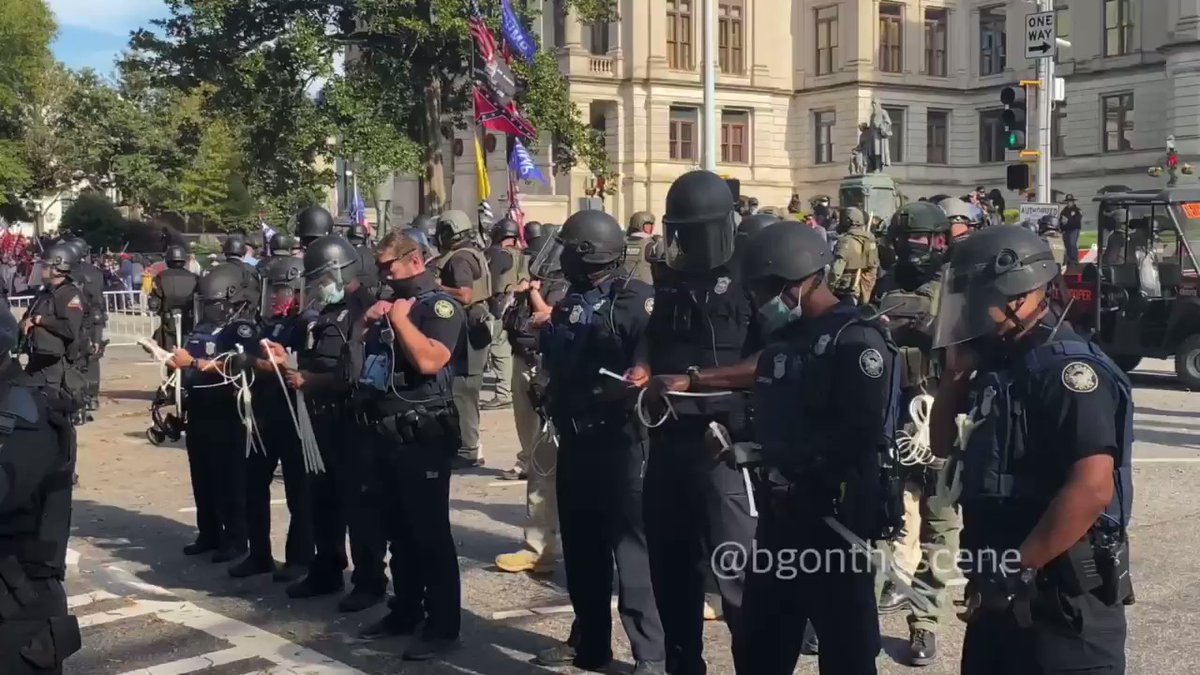 Police are preparing the zip tie handcuffs here in Atlanta Georgia 