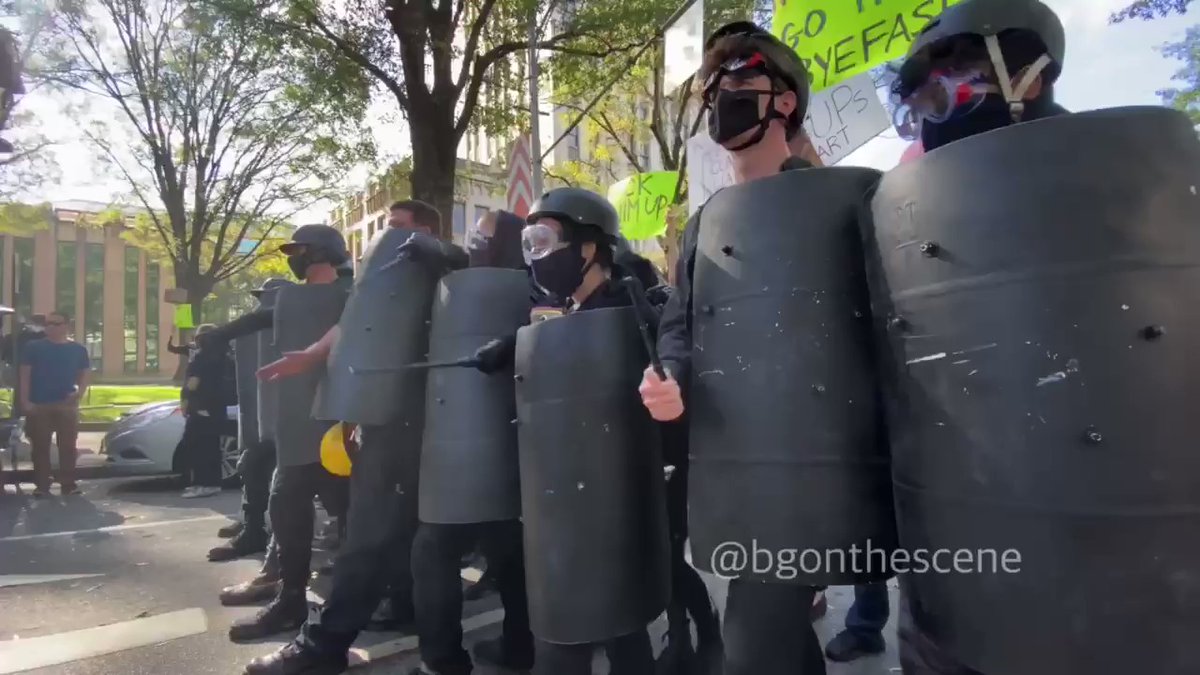 Shields out from the protesters in black bloc outside Atlanta City Hall Atlanta Georgia 