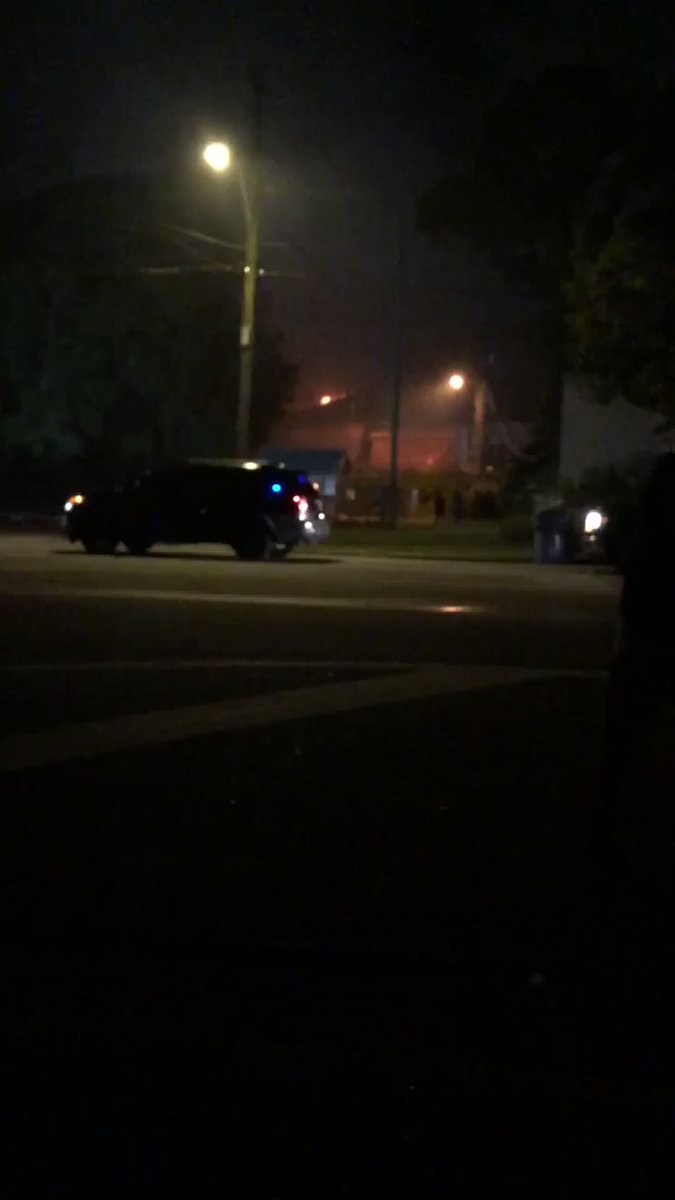 Firefighters fighting the blaze right now with the fire hose. This warehouse is about a city block and a half big.