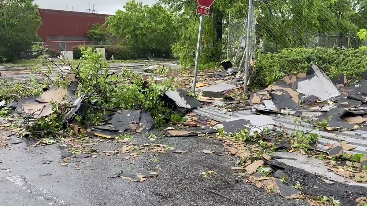 In South Fulton, the storm sent large sheets of metal and roofing flying. Tree limbs and debris are covering this street. 