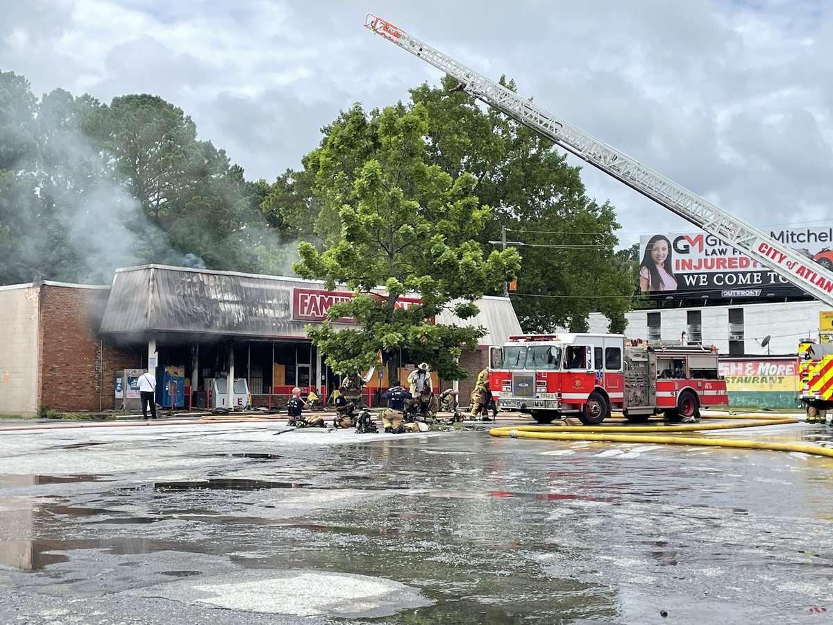 Fire now mostly out at SW Atlanta Family Dollar store. Firefighters say it started at front of store near cash register and 4 workers tried putting out the fire before getting out of control. One customer and all employees made it out safely