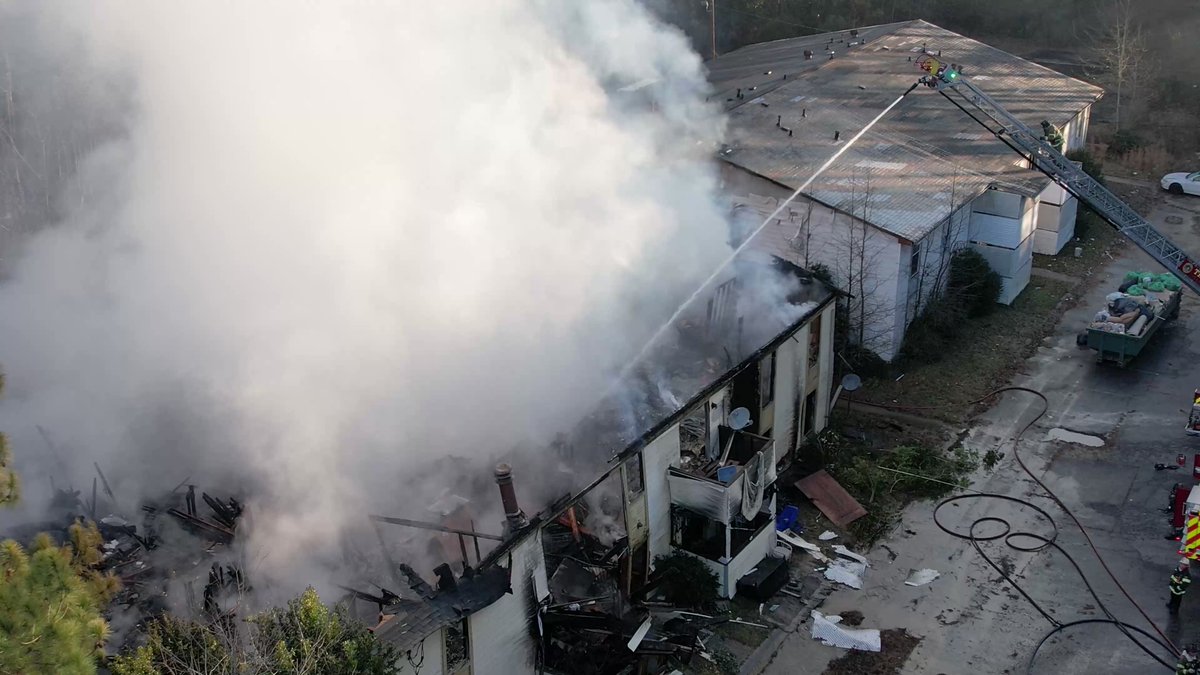 Drone provides an aerial view of DeKalb County Firefighters hard at work containing a large fire at the abandoned Brannon Hill Apartment Complex.  